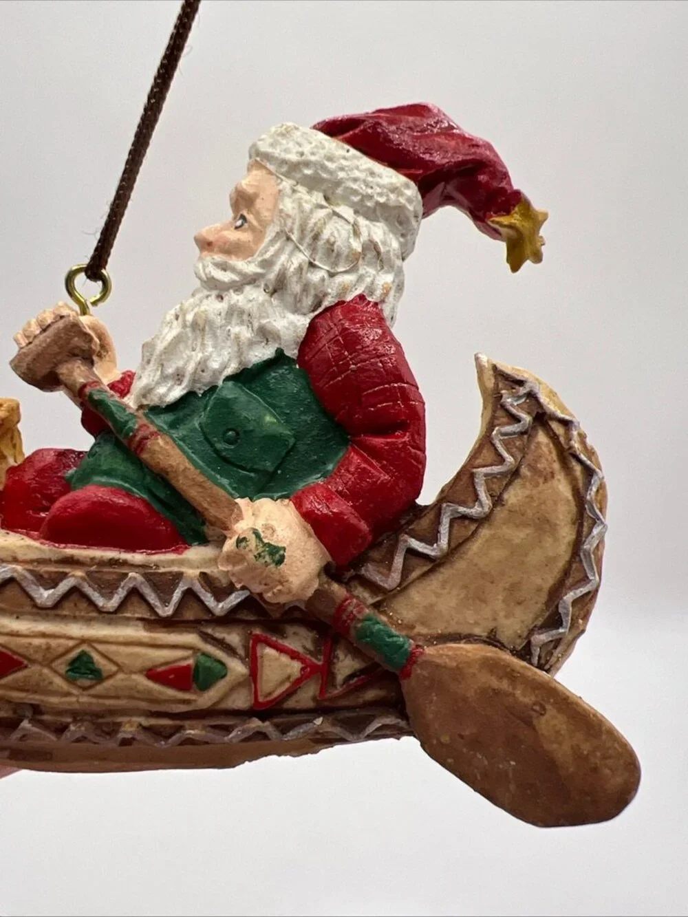 Vtg Santa Paddling His Canoe Folk Art Christmas Ornament 2x3.5”